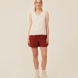 Sleeveless top in creme in a slightly see through material with lining. IvyMD top has a loose fit and a V-neckline.