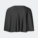 Tailormd Cape is an elegant satin cape designed to add a refined and dramatic finish to any outfit. It drapes effortlessly over the shoulders and fastens at the front with a decorative knot detail, creating a soft, fluid silhouette. Layer it over a dress for special occasions or style it with a simple top for an elevated, sophisticated look. The model is 175 cm tall and is wearing a size XS/S.
