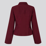 Classic fitted shirt in a cotton mix in a beautiful dark red color/burgundy. ToveMD shirt has a collar, button closure in front and long wide sleeves. The color matches the shirt in the model picture.
