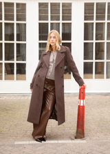 Brown classic, double-breasted wool coat with collar and notch lapels. ShayMD coat, in the color Dark Coffee, has a wide tiebelt at waist, shoulder straps, wide cuffs and open yoke. With lining and single back vent.&nbsp;
