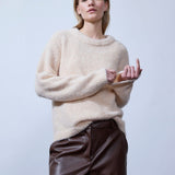 Soft knit in recycled polyester. Philipmd stripe O-neck has long sleeves and a round neckline. The model is 175 cm and wears a size s/36.
