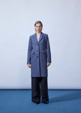 Beautiful, long wool coat. Pamela coat is closed by 3 big buttons at front and is waisted, which gives a feminine look. Because of the high content of wool you will be able to keep warm all through fall and the mild winters. The model is 176 cm and wears a size S/36