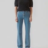 AuroraMD o-neck is created from organic cotton with an airy crochet look. The jumper has a round neckline and short sleeves with wide hem.