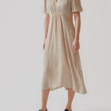 Feminine dress in floral printed EcoVero viscose. RavenMD long print dress is full length with flattering smock details on shoulder and waist. The model is 173 cm and wears a size S/36
