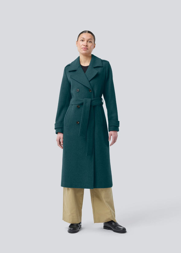 Classic, double-breasted wool coat with collar and notch lapels. ShayMD coat has a wide tiebelt at waist, shoulder straps, wide cuffs and open yoke. With lining and single back vent.
