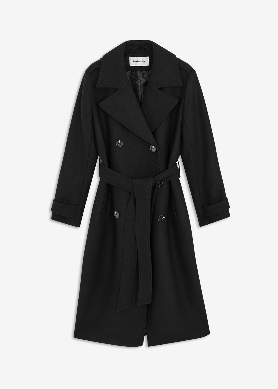 Black long double-breasted coat in a wool blend. It has notch lapels, shoulder tabs, wide cuff straps and a storm flap. A tie belt defines the waist, and a single vent opens at the back. Wear it belted over tailoring or open over a soft knit. The model is 175 cm and wears a size S/36.