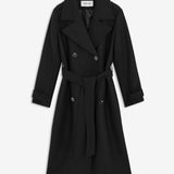 Black long double-breasted coat in a wool blend. It has notch lapels, shoulder tabs, wide cuff straps and a storm flap. A tie belt defines the waist, and a single vent opens at the back. Wear it belted over tailoring or open over a soft knit. The model is 175 cm and wears a size S/36.