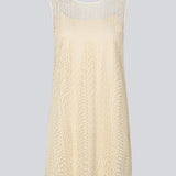 Sleeveless dress in a short length cut from a lace material. DionaMD dress has a round neck in front and a deep neckline in the back. The model is 177 cm and wears a size S/36.