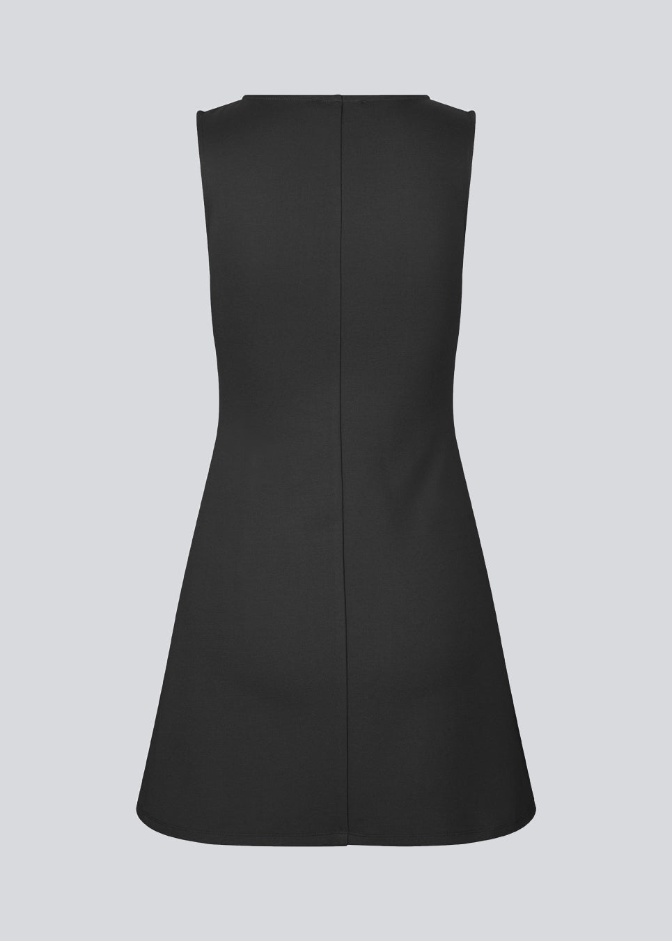 Fitted black mini dress in an A-line shape with a round neck and no sleeves. JosefineMD tank flare dress is made from a stretchy material. The model is 177 cm and wears a size S/36.