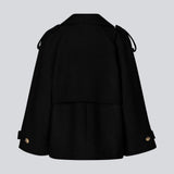 Cropped double-breasted wool coat with hidden buttons. EsmundMD jacket has classic coat details with raglan sleeves and an high yoke at the back. Lined. The model is 175 cm and wears a size S/36.
