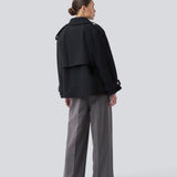 Cropped double-breasted wool coat with hidden buttons. EsmundMD jacket has classic coat details with raglan sleeves and an high yoke at the back. Lined. The model is 175 cm and wears a size S/36.