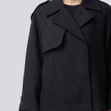 Cropped double-breasted wool coat with hidden buttons. EsmundMD jacket has classic coat details with raglan sleeves and an high yoke at the back. Lined. The model is 175 cm and wears a size S/36.
