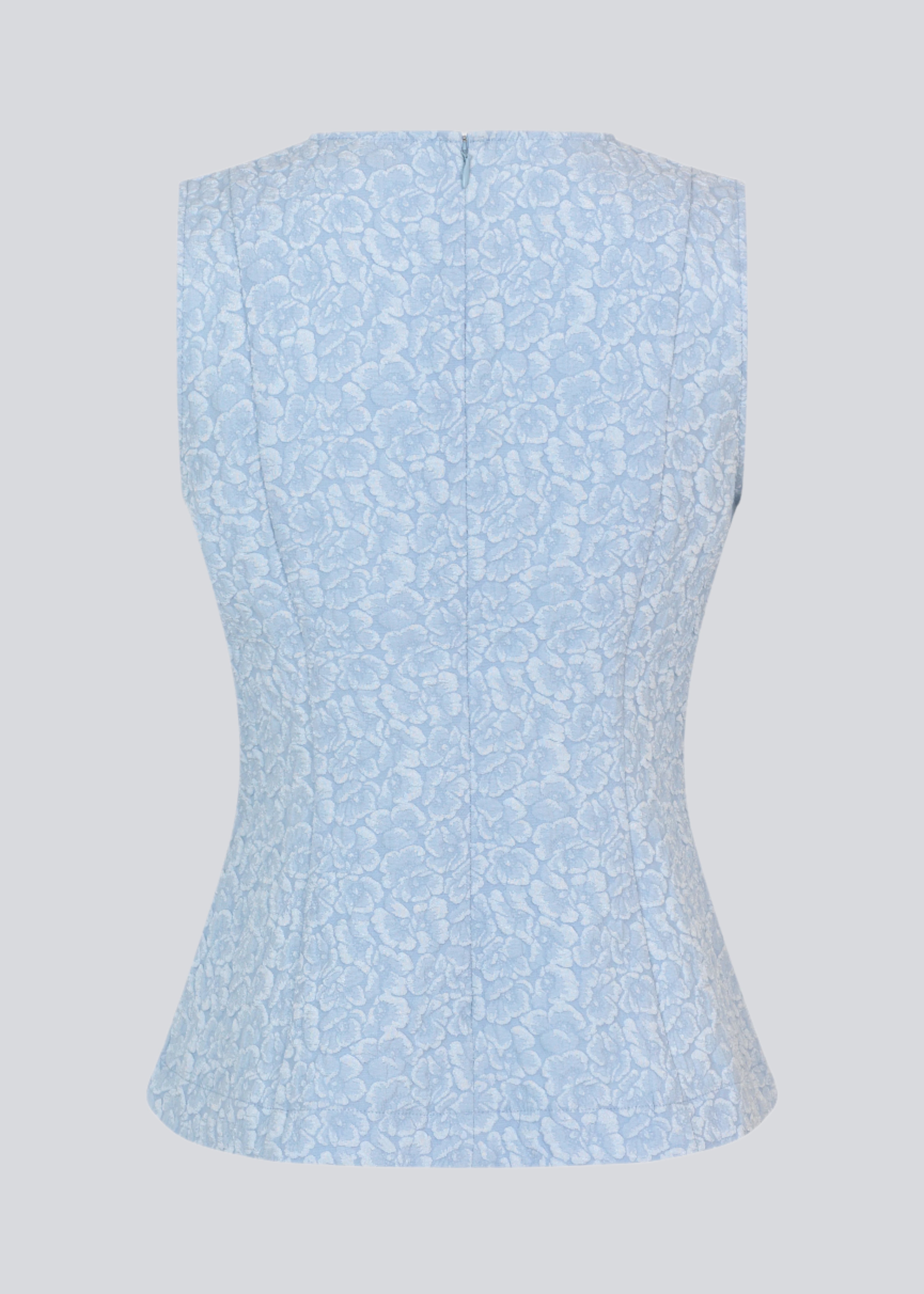 Tailored top without sleeves made from a structured material. HollisMD top has a high v-shaped neckline with a hidden zipper at the neck.