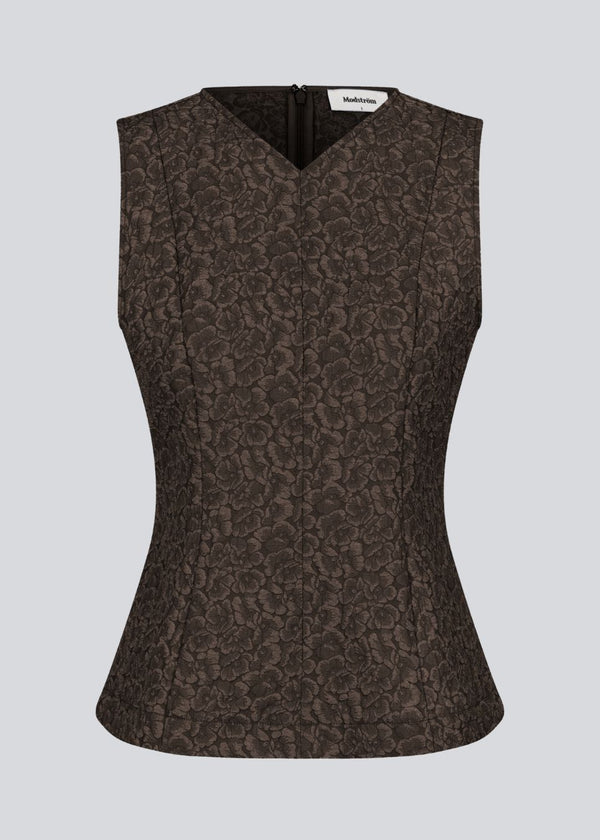 Brown tailored top without sleeves made from a structured material. HollisMD top has a high v-shaped neckline with a hidden zipper at the neck.&nbsp;