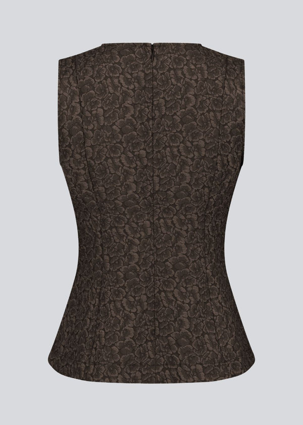 Brown tailored top without sleeves made from a structured material. HollisMD top has a high v-shaped neckline with a hidden zipper at the neck.&nbsp;