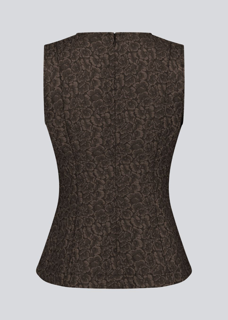 Brown tailored top without sleeves made from a structured material. HollisMD top has a high v-shaped neckline with a hidden zipper at the neck.&nbsp;