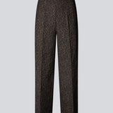 Brown pants with straight legs in a structured material. HollisMD pants have a medium waist with hidden zipper at one side, and two welt pockets on the back.&nbsp;