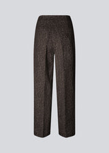 Brown pants with straight legs in a structured material. HollisMD pants have a medium waist with hidden zipper at one side, and two welt pockets on the back.&nbsp;