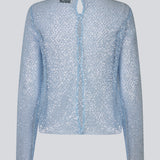 Top with relaxed fit and slightly shorter body covered in sequins. GerardMD top has long sleeves, a round neckline and split back with button closure. The model is 175 cm and wears a size S/36.