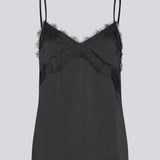Satin top with a soft drape in black with black lace. TenjaMD top is detailed with lacing on the front and has thin straps.