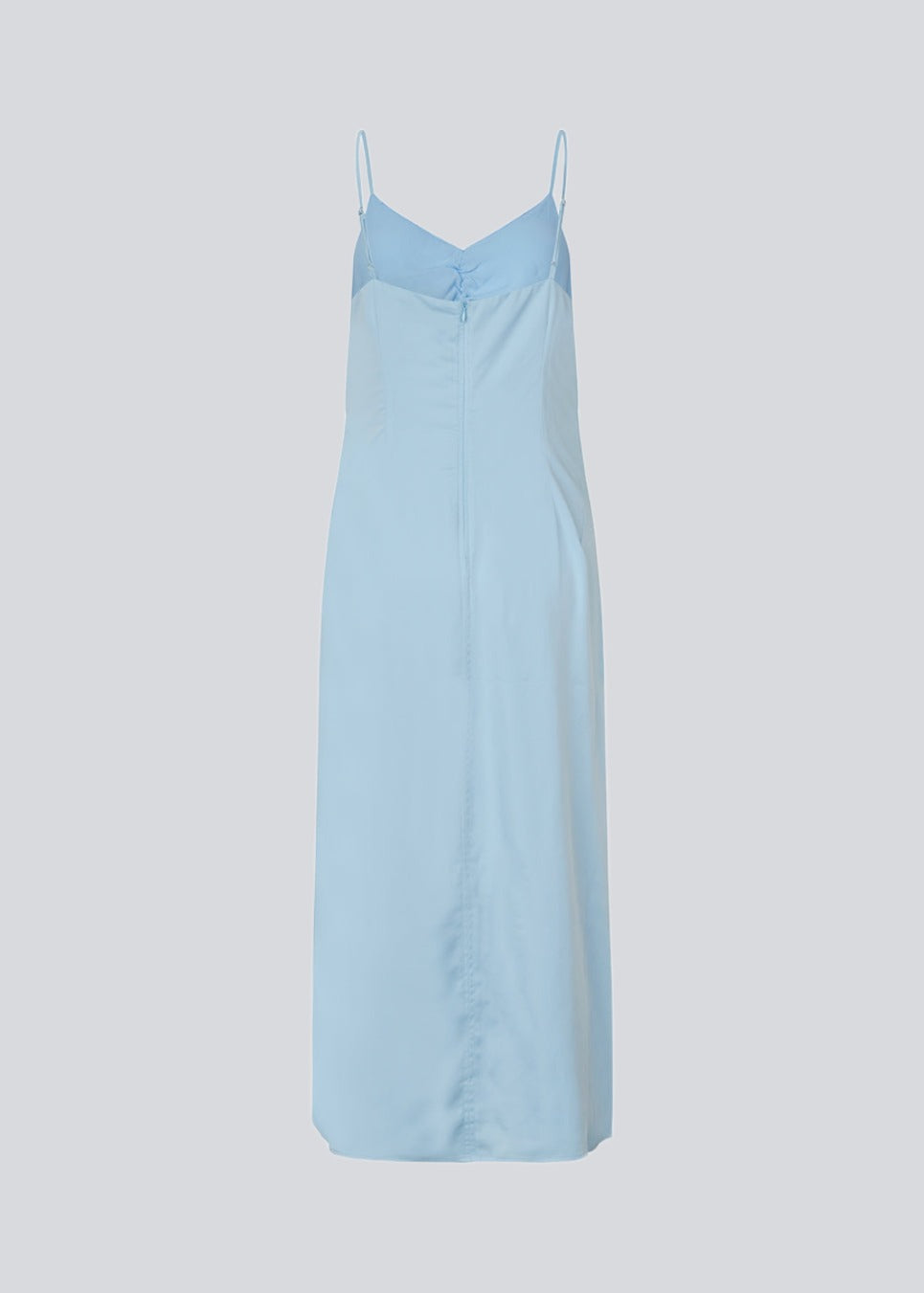 Maxi dress in baby blue with thin straps and an elastic gathering at the chest. TrentonMD print dress has a slit in the front and an invisible zipper at the back.<br>