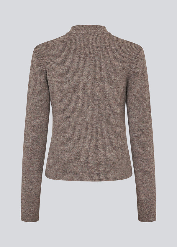Fitted cardigan in brown in a soft knit. TreeMD cardigan has a high neck and a zipper closure in front.