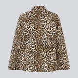 Oversize denim jacket/shirt in leopard print with button closure in front and long wide sleeves. TylinMD print jacket has two pockets at the chest and a shirt collar.