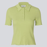 Fitted green polo in jersey. MagdaloneMD polo has short sleeves and babylock edges.&nbsp;