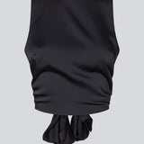 Sleeveless top in satin in dark navy blue. TailorMD top has an open back with a tieband.