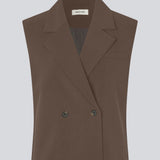 Loose vest with a collar in our classic gale material. Galemd vest is sleeveless and has a front button closure