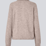 Knitted polo in beige with long sleeves. Treemd polo has a placket closure and 4 buttons.&nbsp;