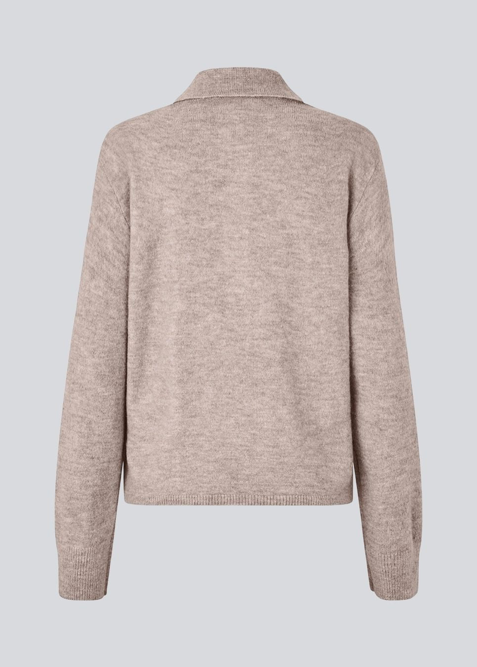 Knitted polo in beige with long sleeves. Treemd polo has a placket closure and 4 buttons.&nbsp;