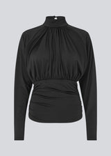 Elegant black blouse featuring a high neckline and long sleeves. Designed with delicate gathered details at the bust and waist to create a flattering silhouette. A subtle button closure at the back of the neck adds a refined and feminine touch. The stretchy fabric ensures a comfortable fit, while the draped design offers timeless elegance. Perfect for both everyday wear and special occasions.