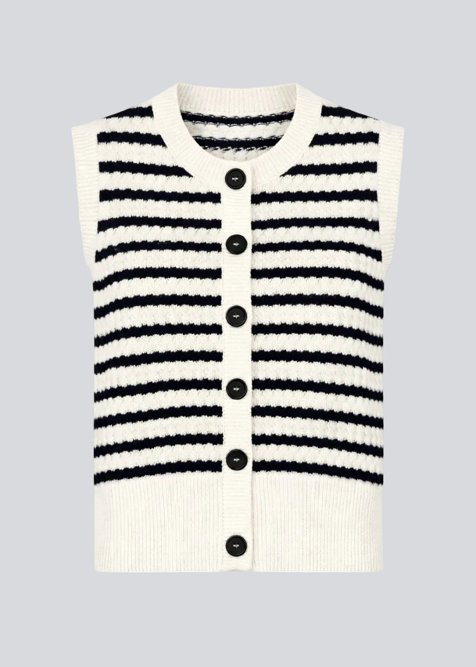 Knitted vest in navy and white with a round neckline and front button closure. The UlvaMD Stripe Top features a classic striped pattern and wide ribbed trims for a flattering fit. Made from 100% organic cotton – perfect for layered styling.&nbsp;