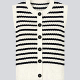 Knitted vest in navy and white with a round neckline and front button closure. The UlvaMD Stripe Top features a classic striped pattern and wide ribbed trims for a flattering fit. Made from 100% organic cotton – perfect for layered styling.&nbsp;