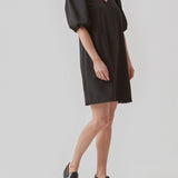 Short dress in black with relaxed fit and v-neckline. The sleeves on AshaMD dress are short and voluminous with elasticated cuffs.  Material: 100% Polyester  Lining: 100% Polyester