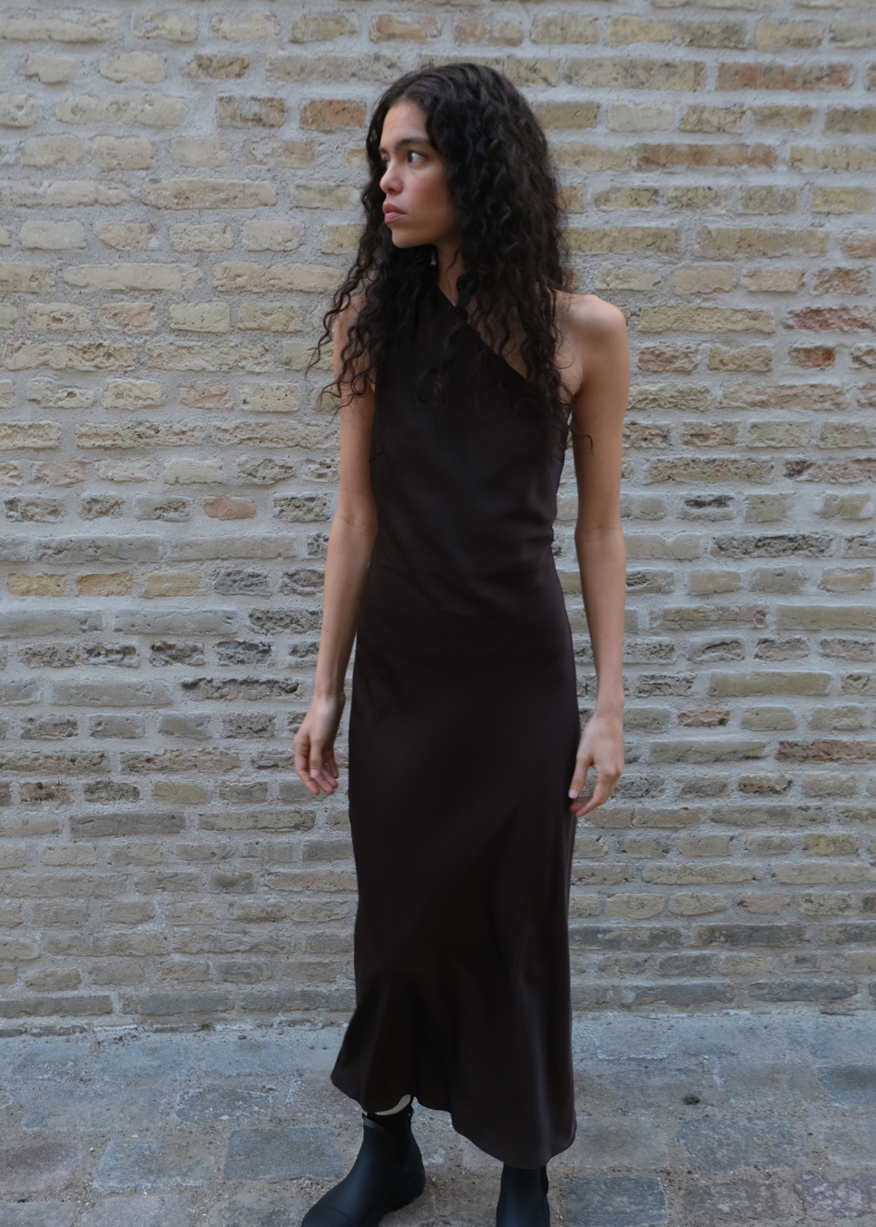 Dark brown maxi one-shoulder dress in satin. NarcissaMD dress has an open back with beautiful details and an invisible zipper on the side.