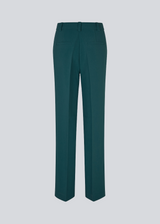 The dark green gale pants has a classic design. The pants has straight, wide legs with pressfolds, which creates an elegant look.