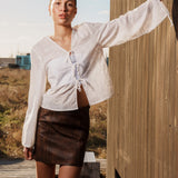 Short A-line skirt in lamb leather with a medium-high waist. IsmaelMD skirt has a vintage-inspired look and a hidden zipper in the side.