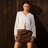 Short A-line skirt in lamb leather with a medium-high waist. IsmaelMD skirt has a vintage-inspired look and a hidden zipper in the side.