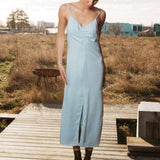 Maxi dress in baby blue with thin straps and an elastic gathering at the chest. TrentonMD print dress has a slit in the front and an invisible zipper at the back.