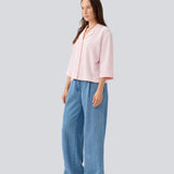 Shirt in a relaxed silhouette and 3/4 lengthsleeves. AaliyahMD shirt has a resort collar, dropped shoulders and button closure in front.