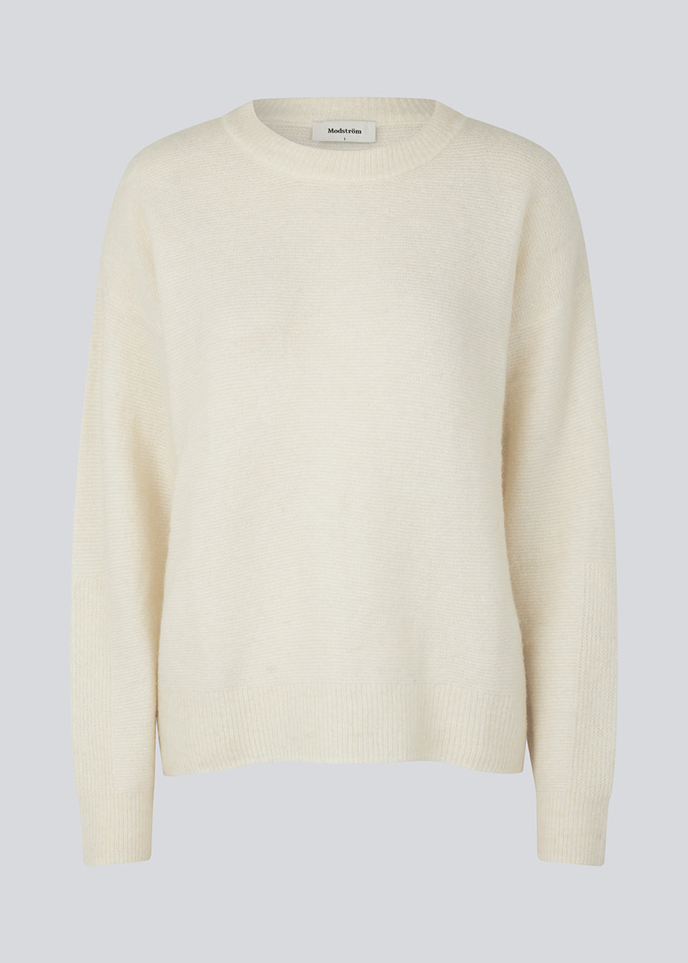 Fine-knitted jumper with wool and llama wool. AdrianMD o-neck has a round neck and long sleeves with ribbed trimmings. Dropped shoulders and a casual fit.