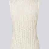 Sleeveless top in a sheer knit pattern. The AgnesMD Top features a round neckline and is perfect for layering. A modern and lightweight top that combines elegance with versatility.
