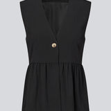 Feminine vest top with a gathered, loose hem. The AgneteMD Vest is sleeveless with a V-neckline and a simple button closure. Can be styled alone or layered for a modern and versatile look.