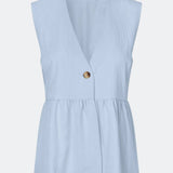 Feminine vest top with a gathered, loose hem. The AgneteMD Vest is sleeveless with a V-neckline and a simple button closure. Can be styled alone or layered for a modern and versatile look.
