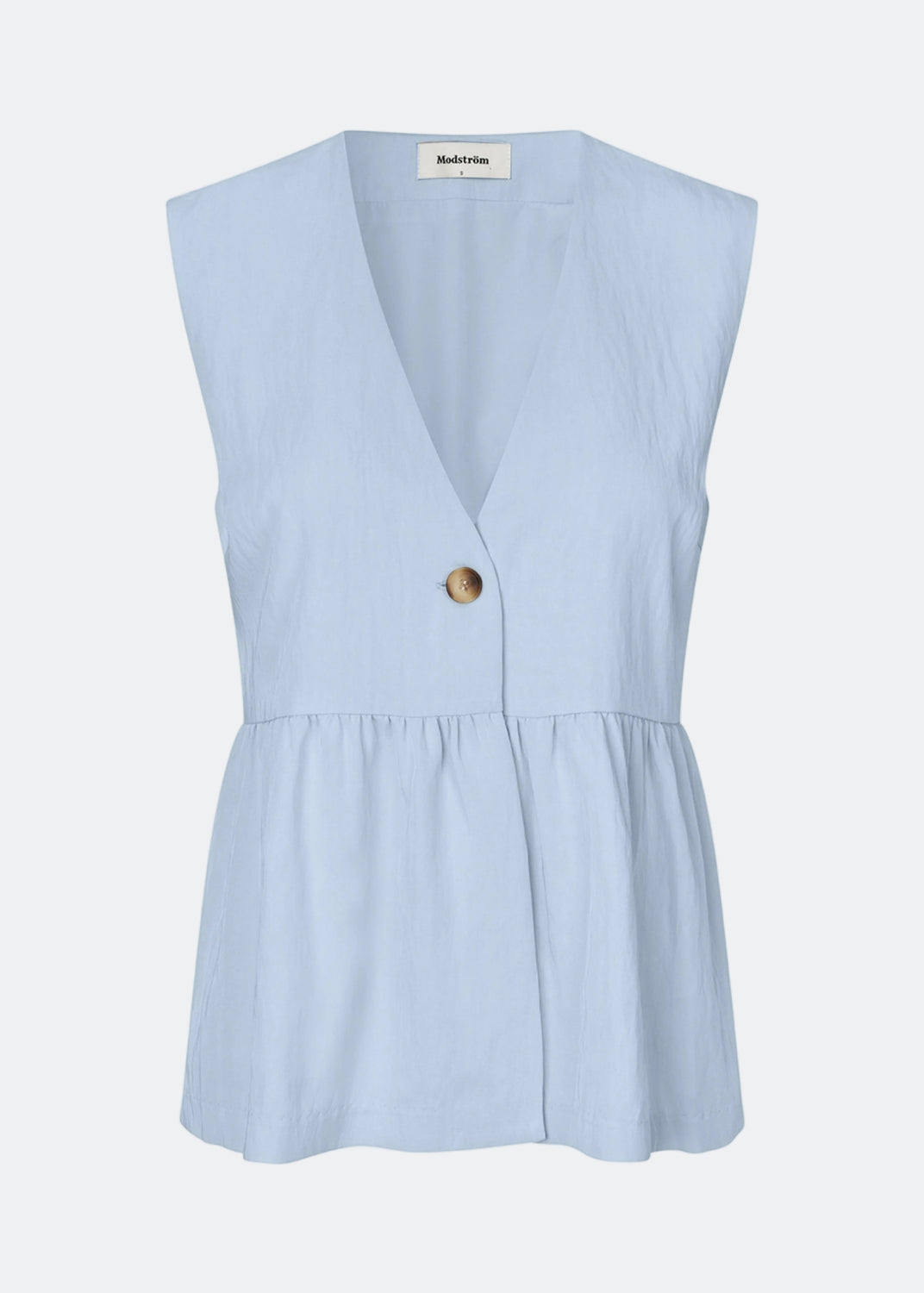 Feminine vest top with a gathered, loose hem. The AgneteMD Vest is sleeveless with a V-neckline and a simple button closure. Can be styled alone or layered for a modern and versatile look.