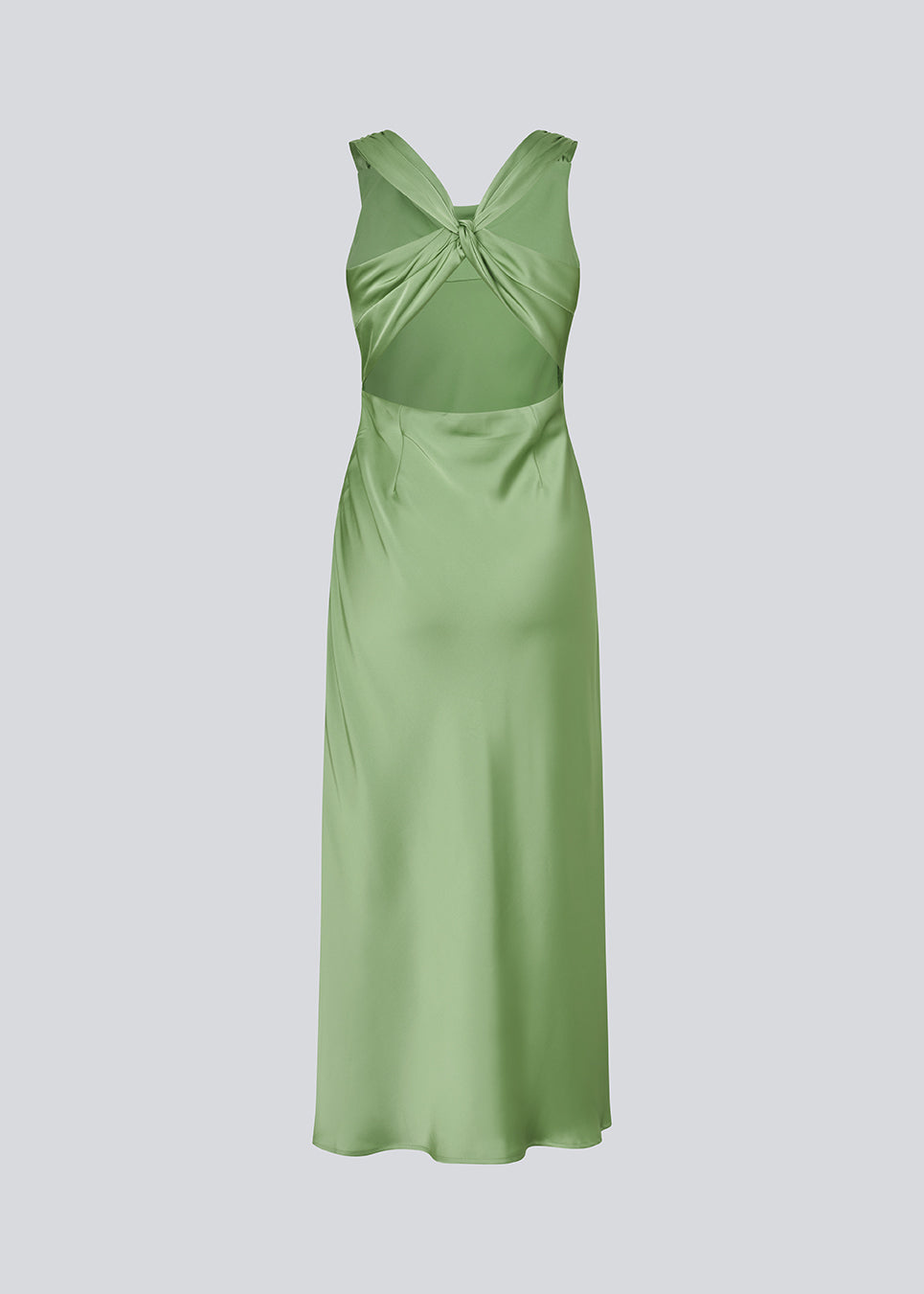 Long dress in lustrous satin with an open back. The AijaMD Dress features a feminine design with a beautifully draped skirt, a fitted waist, draping at the bust, and an elegant crisscross back. Made from 100% recycled polyester, it’s perfect for both evening and party looks.
