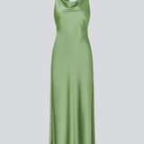 Long dress in lustrous satin with an open back. The AijaMD Dress features a feminine design with a beautifully draped skirt, a fitted waist, draping at the bust, and an elegant crisscross back. Made from 100% recycled polyester, it’s perfect for both evening and party looks.