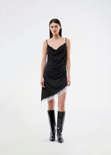 Short satin slip dress with contrast lace trim. The AlinkaMD Dress features spaghetti straps, a V-neckline, and an asymmetrical hem that is longer on one side. An elegant dress, perfect on its own or for layered styling.